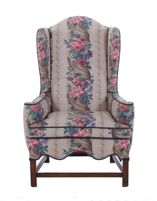 Appraisal: George III style wingback chair circa curved crest leading to