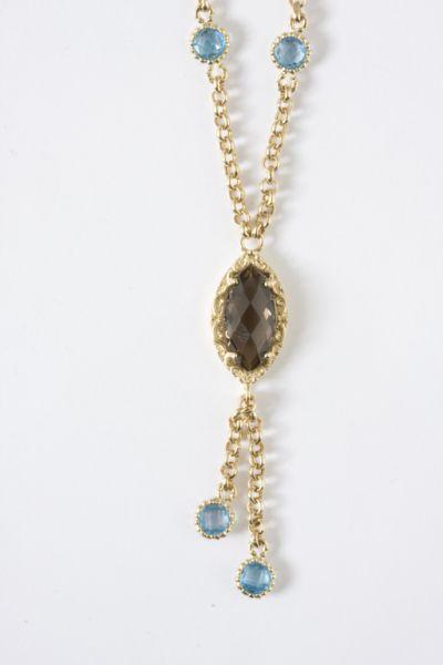 Appraisal: KT Blue Topaz and Smoky Quartz Sautoir with round link