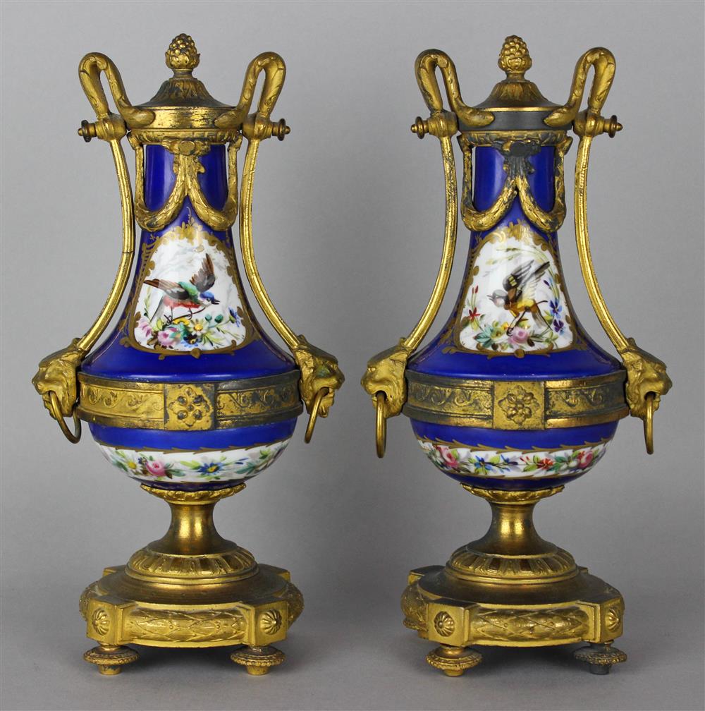 Appraisal: PAIR OF GILT-BRONZE-MOUNTED SEVRES STYLE BLUE GROUND VASE late th