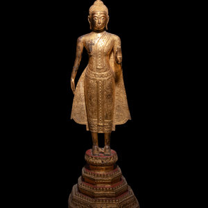 Appraisal: A Thai Gilt Bronze Figure of Standing Buddha TH CENTURY