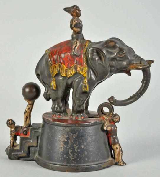 Appraisal: Cast Iron Elephant Clowns Mechanical Bank Description Manufactured by J