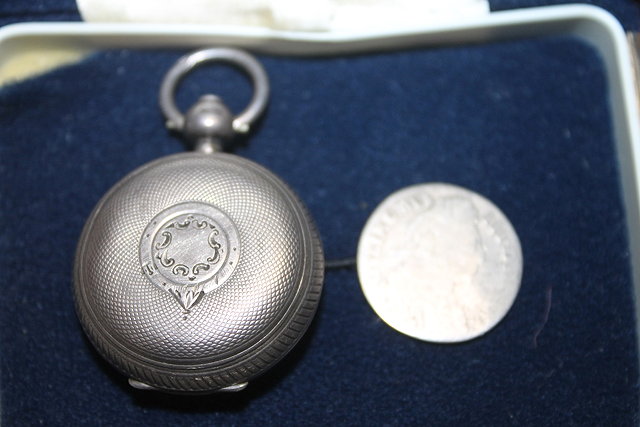 Appraisal: A SILVER SOVEREIGN CASE with engine turned decoration Birmingham together