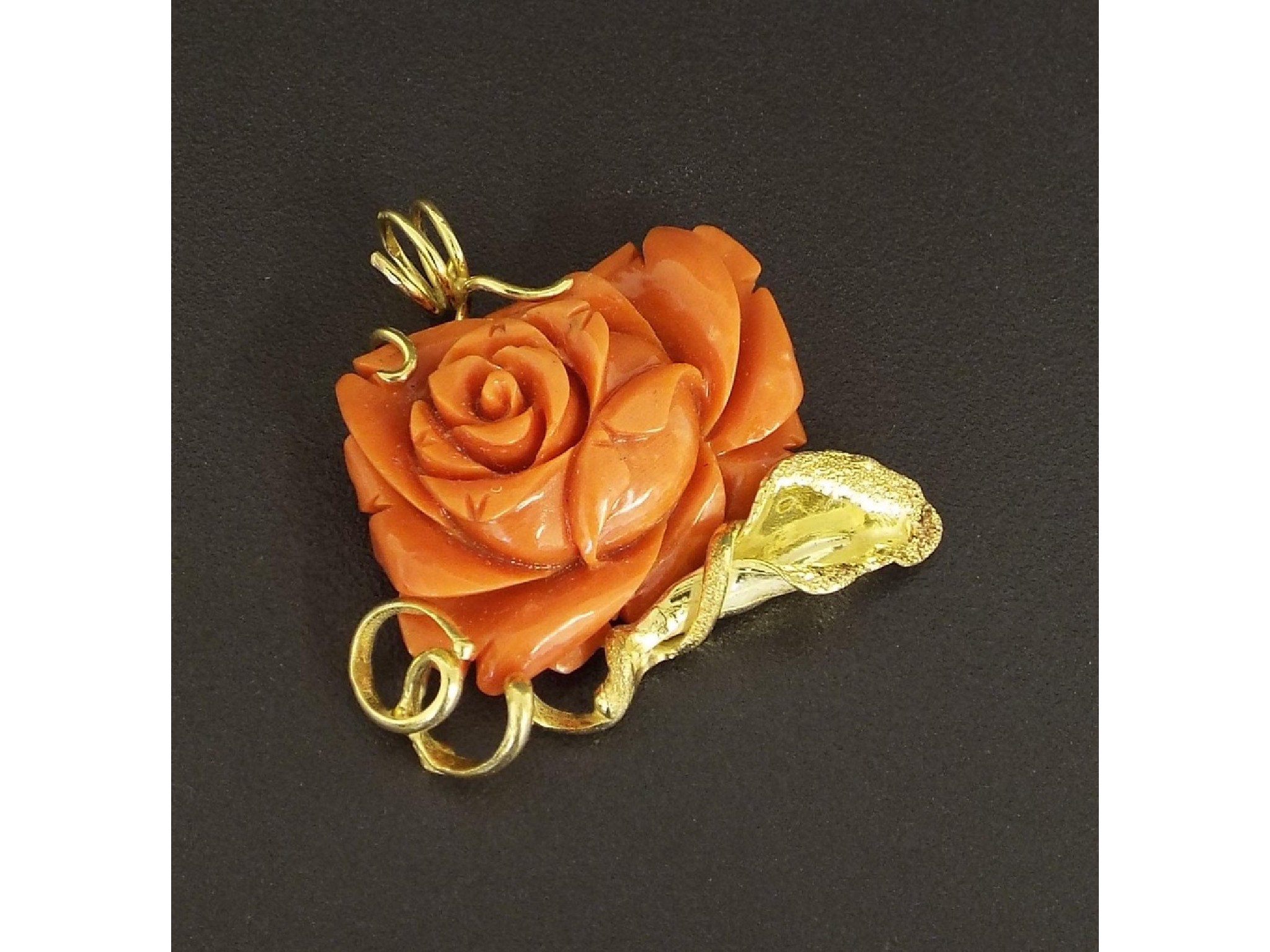 Appraisal: k yellow gold mounted carved coral rose pendant gm mm