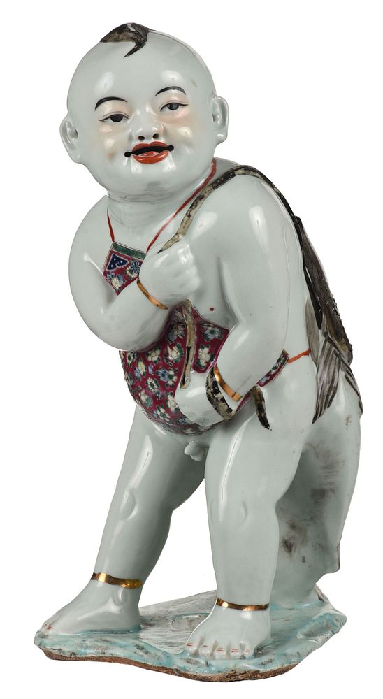 Appraisal: Chinese Ceramic Figure of Boy Carrying Fish th century in