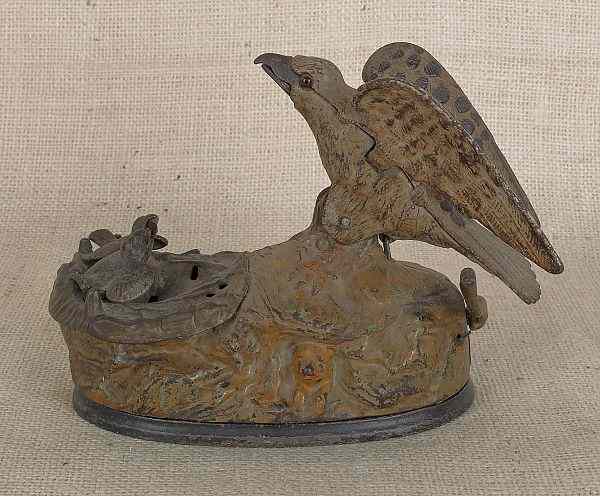 Appraisal: Cast iron eagle and eaglets mechanical bank