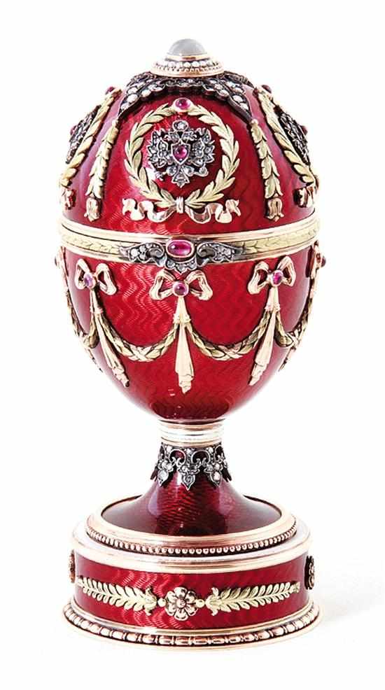 Appraisal: Faberge style diamond-set gold egg th century bearing spurious Russian