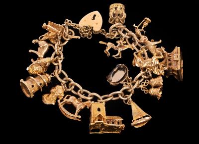 Appraisal: A ct yellow gold charm bracelet the curb link chain