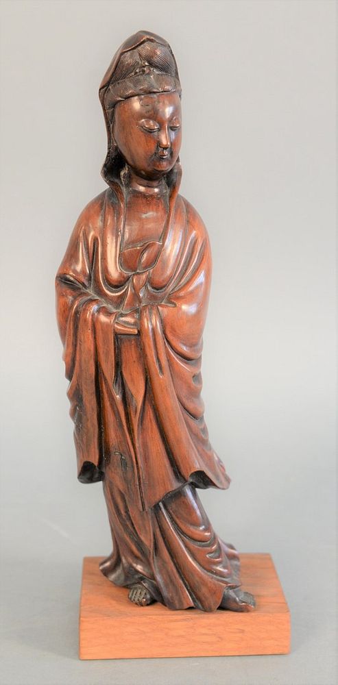 Appraisal: Chinese carved wood figure of a Guanyin intricately carved standing