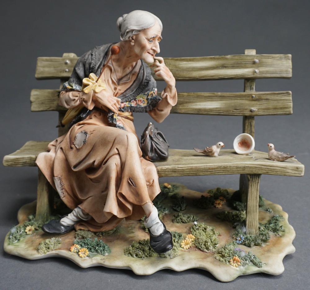 Appraisal: CAPODIMONTE PORCELAIN FIGURE OF ELDERLY WOMAN ON PARK BENCH H