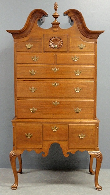 Appraisal: - Bonnet-top walnut two-piece highboy with upper shell carved small