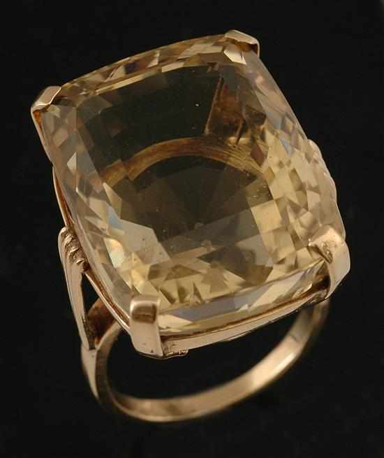 Appraisal: A citrine cocktail ring The large cushion cut citrine weighing