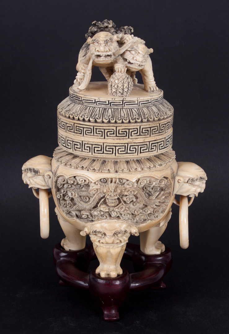 Appraisal: Chinese carved ivory lidded ding elaborately carved and ink-highlighted tripod