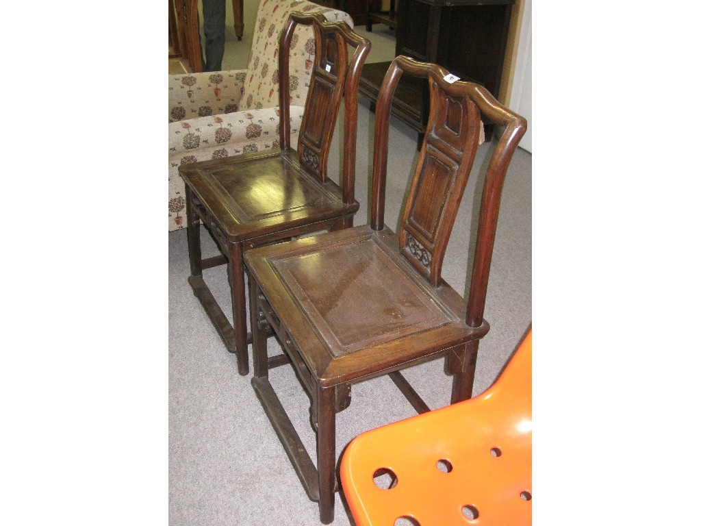 Appraisal: Pair of oriental hardwood side chairs