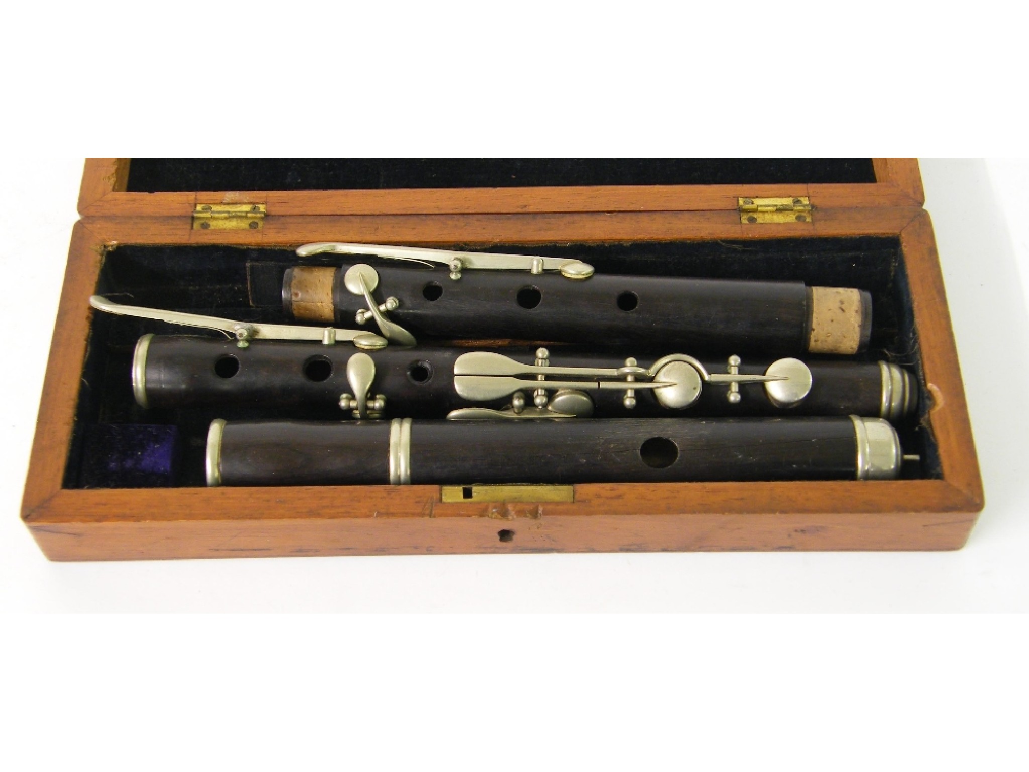 Appraisal: Ebony and nickel mounted eight keyed flute unstamped within a