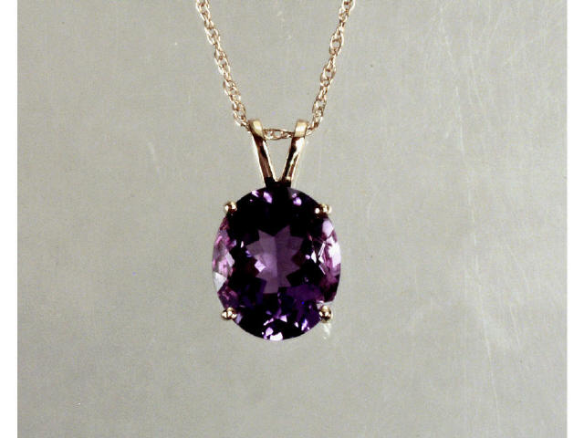 Appraisal: Ladies karat yellow gold oval amethyst pendant Retail