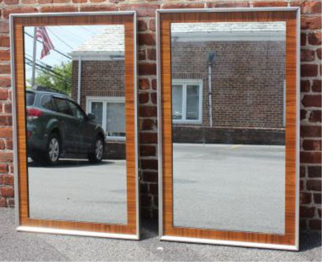 Appraisal: Pair of Midcentury Mirrors Teak or wood recessed accent around