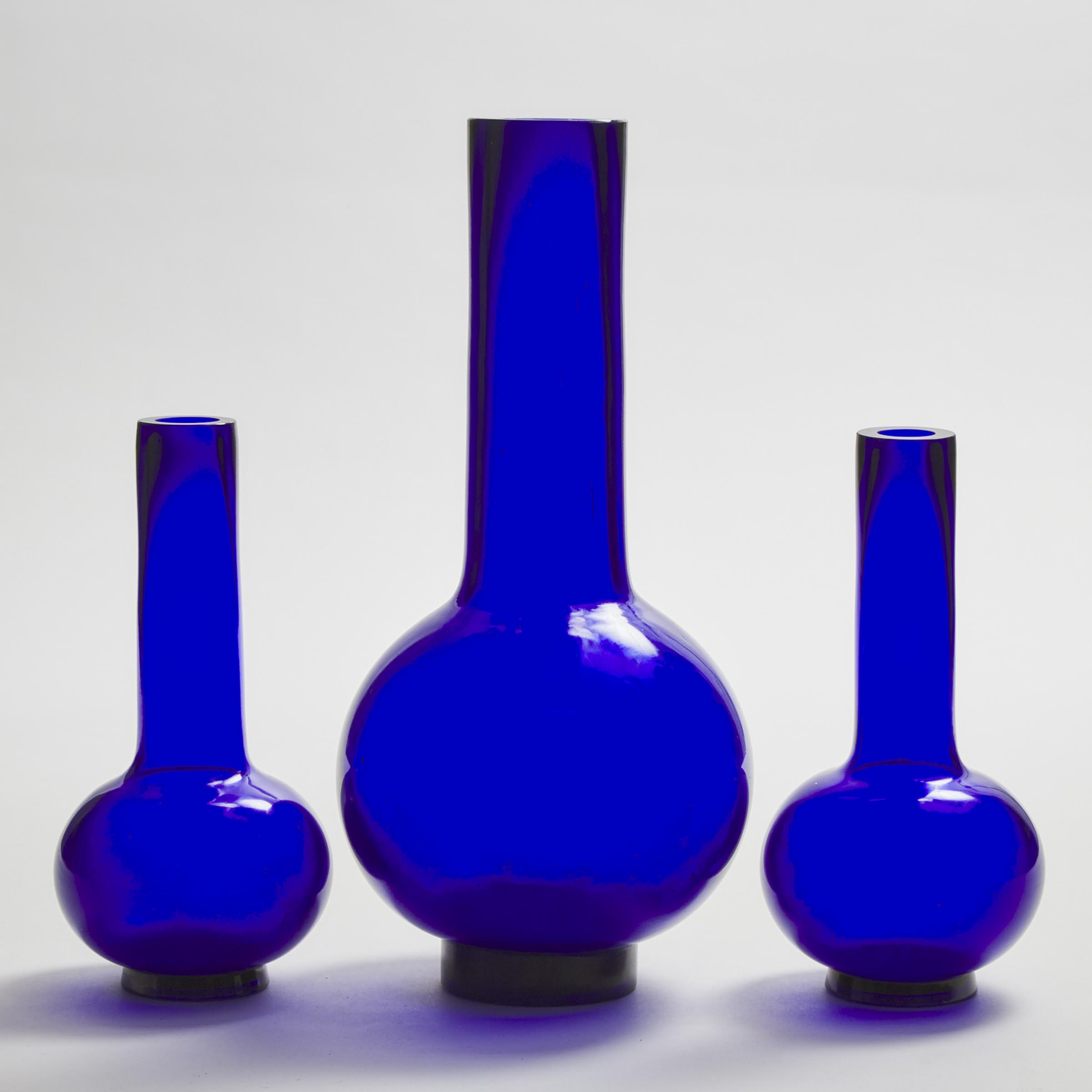 Appraisal: A Group of Three Blue Peking Glass Bottle Vases Early