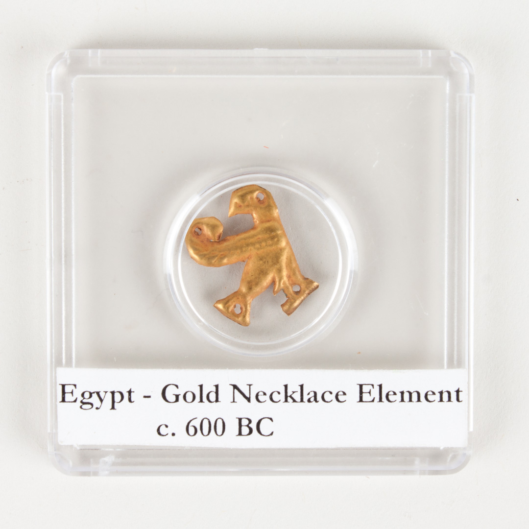 Appraisal: Ancient Egyptian gold necklace element modeled as a hawk with