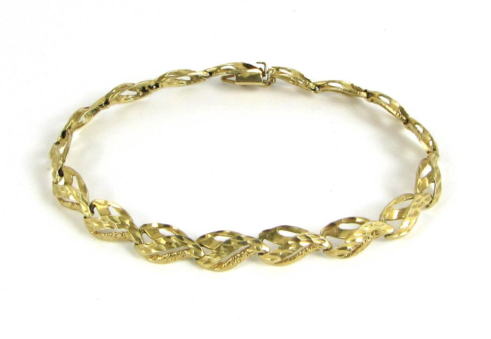 Appraisal: FOURTEEN KARAT YELLOW GOLD LINK BRACELET measuring - in length