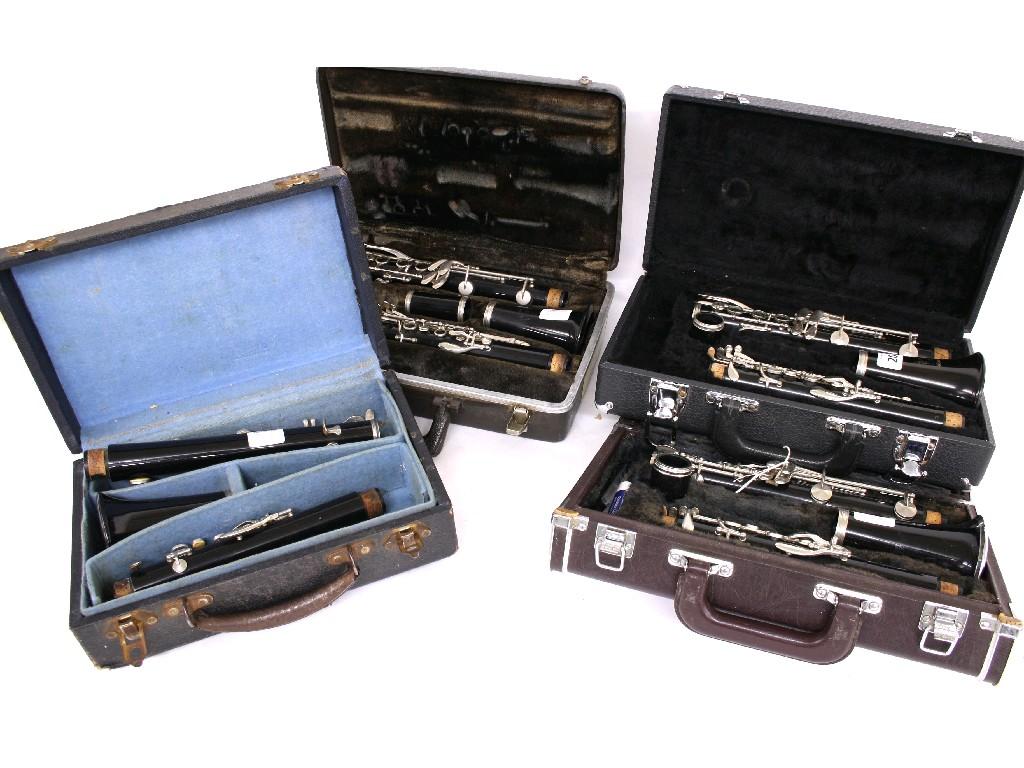 Appraisal: Two ebonite Boosey Hawkes clarinets together with another two ebonite