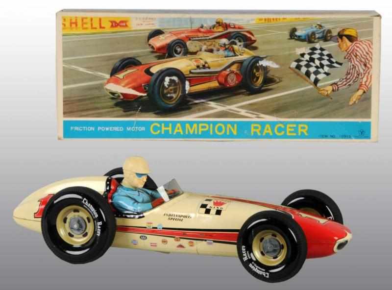 Appraisal: Tin Champion Race Car Friction Toy Description Japanese Working Made