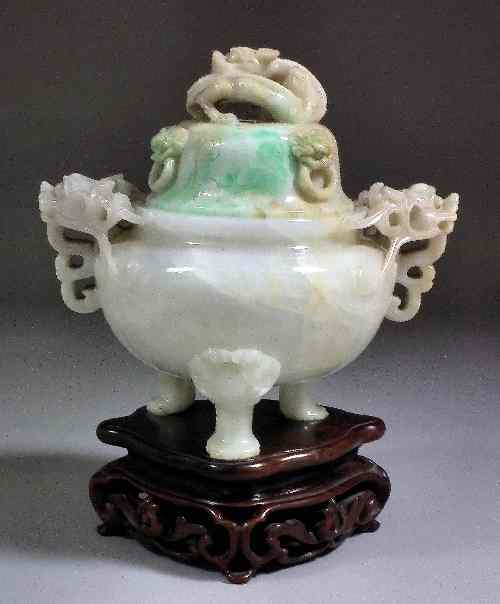 Appraisal: A Chinese pale green jadeite two-handled censor and cover with