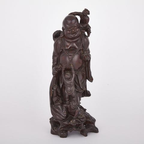 Appraisal: A Boxwood Carving of Buddha with Boys Early th Century