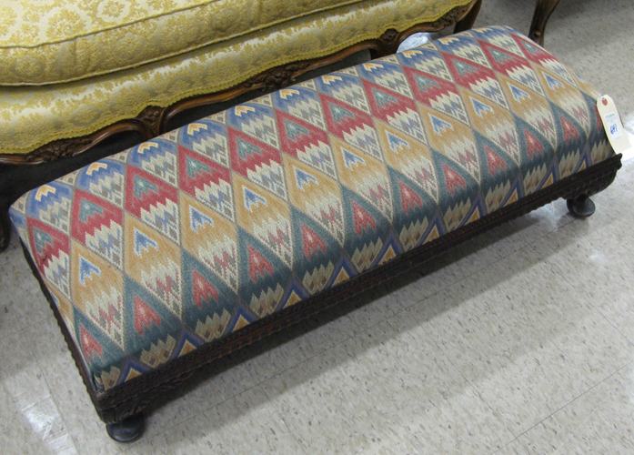 Appraisal: A LONG QUEEN ANNE REVIVAL FOOTSTOOL American c 's the