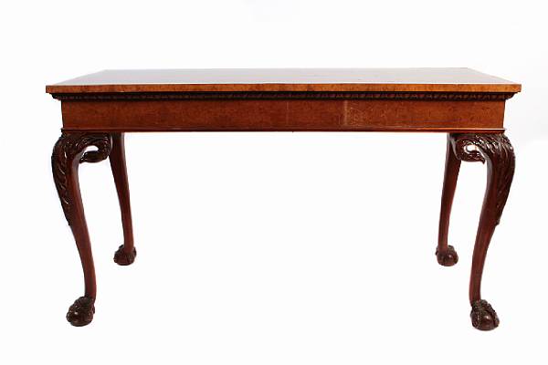 Appraisal: A pair of George III style mahogany and burlwood console