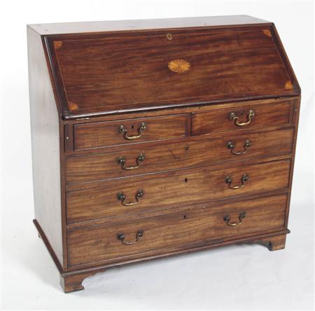 Appraisal: A George III mahogany inlaid bureau the moulded fall-flap with