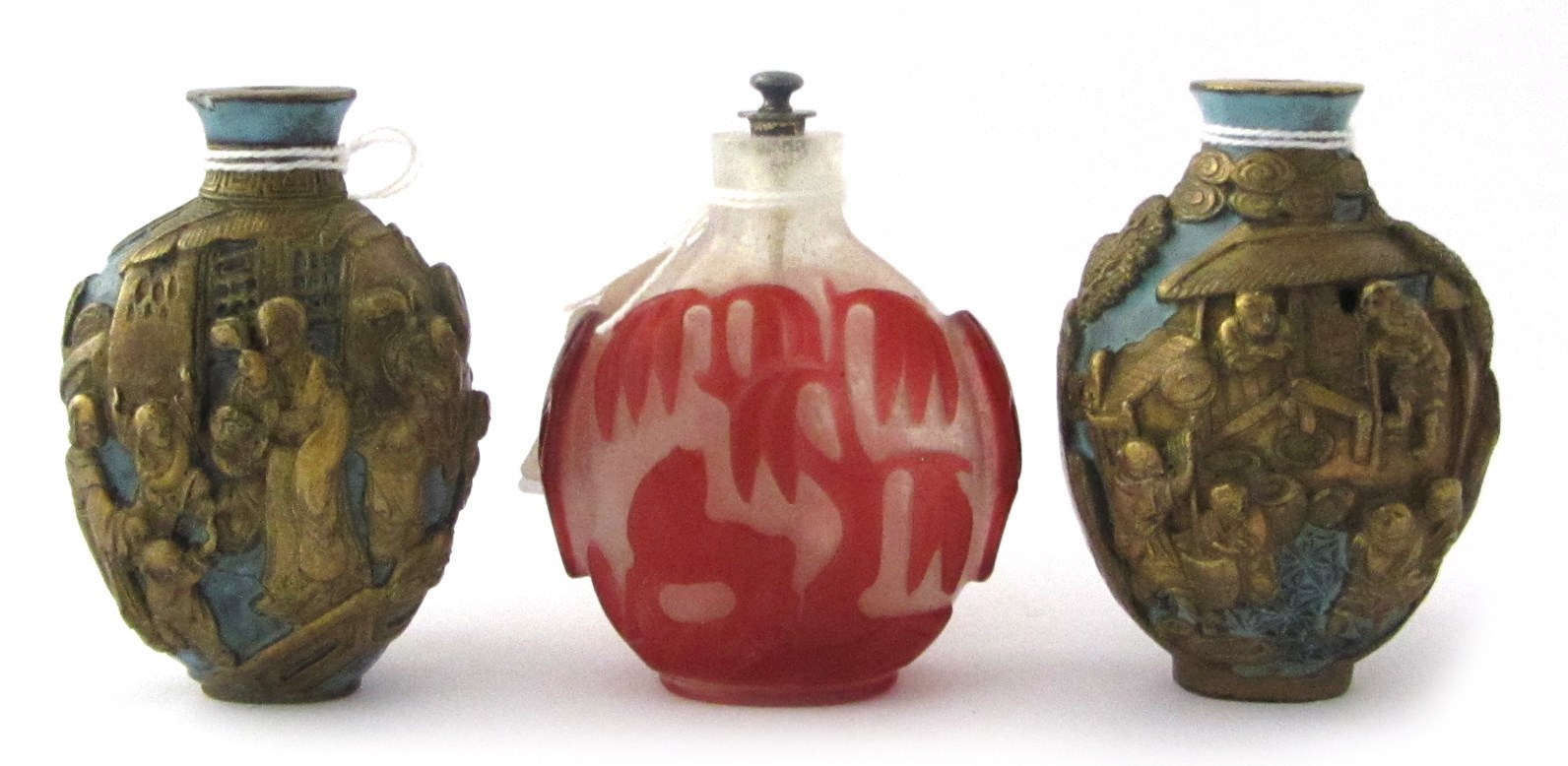 Appraisal: A Chinese red overlay glass snuff bottle th th each