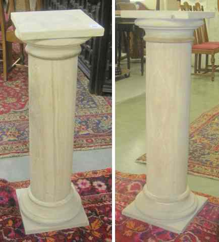 Appraisal: A PAIR OF SANDSTONE ARENITE PILLAR-FORM PEDESTALS each having a