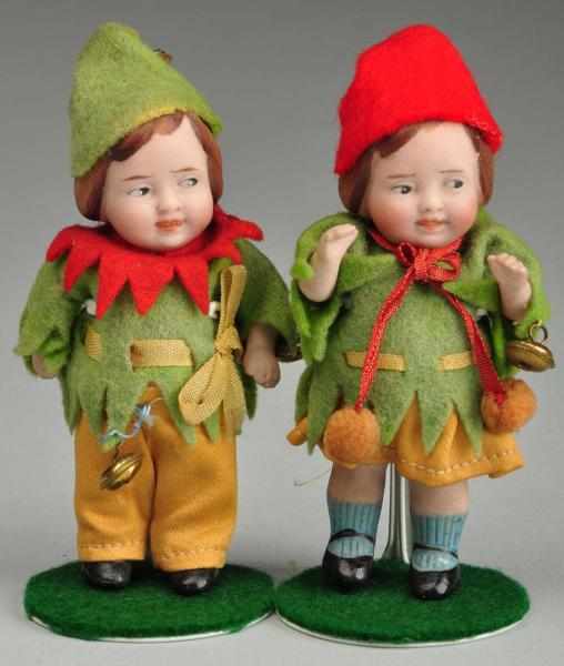 Appraisal: Pair of German All Bisque Dolls Description Molded and painted