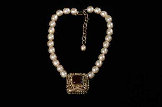 Appraisal: CHANEL GRIPOIX NECKLACE Faux pearl necklace with square gold-tone pendant