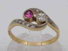 Appraisal: A yellow metal tests carat gold ruby and diamond crossover