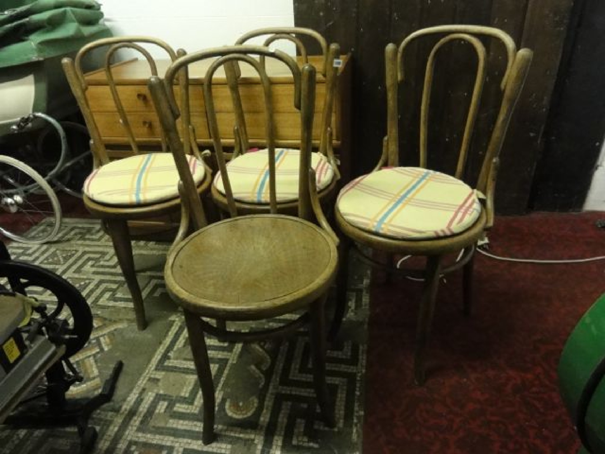 Appraisal: A set of four vintage bentwood caf chairs with circular