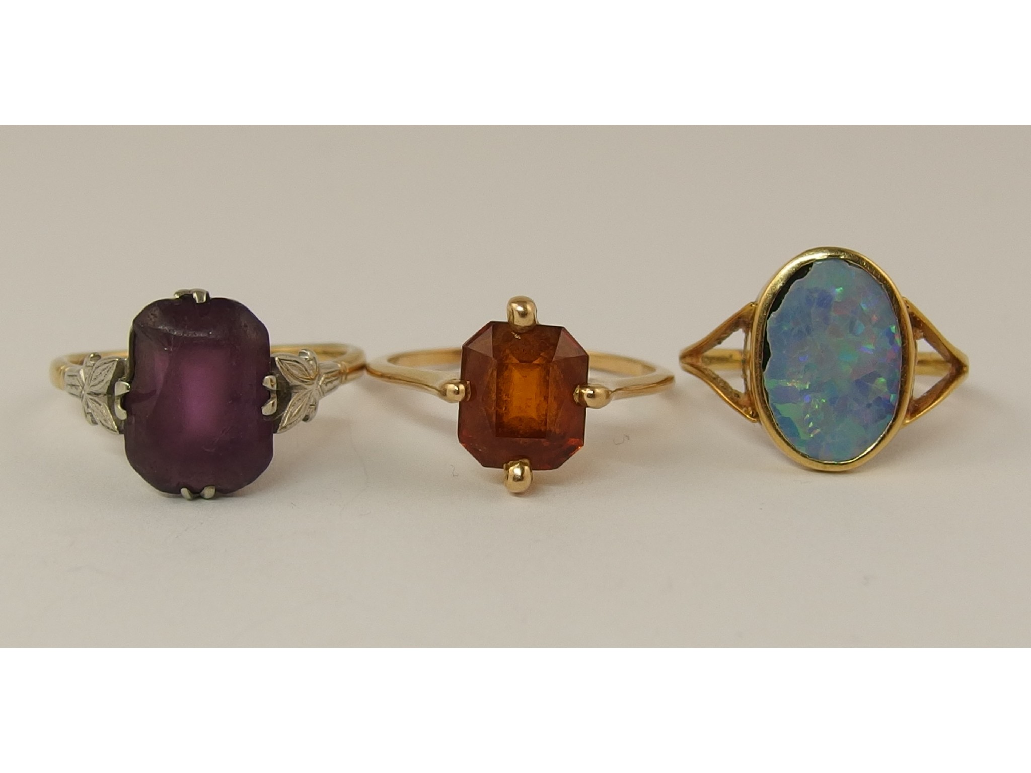 Appraisal: An ct opal doublet ring and two other gem set