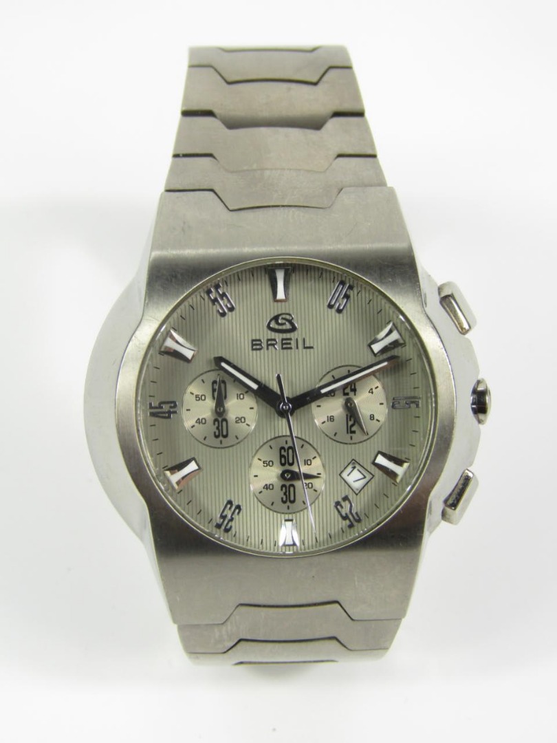 Appraisal: A gentleman's titanium chronograph wristwatch vertical striped silvered dial bearing