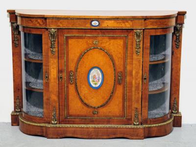 Appraisal: A VICTORIAN WALNUT CREDENZA of D form with stringing burr