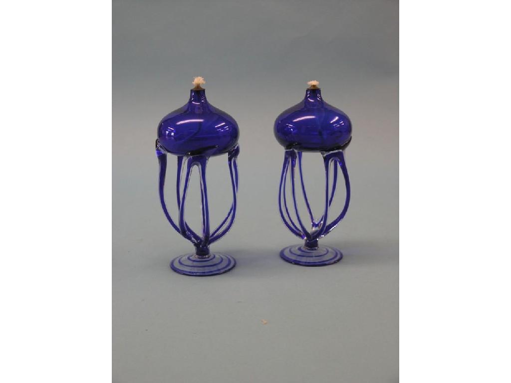 Appraisal: A pair of unusual blue glass oil lamps near globular