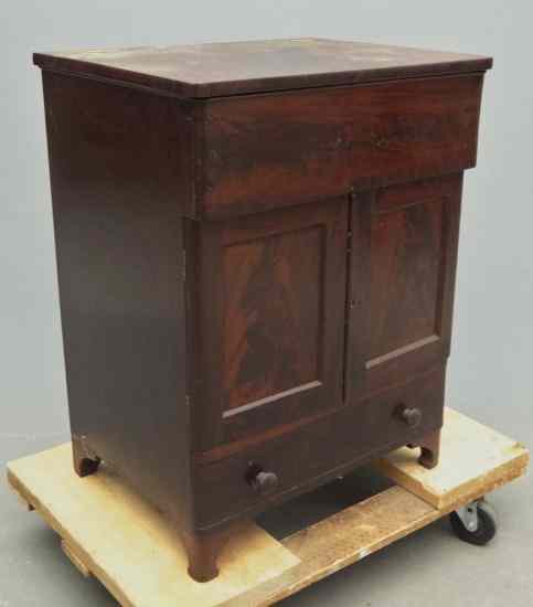 Appraisal: th c mahogany lift top commode '' W '' D