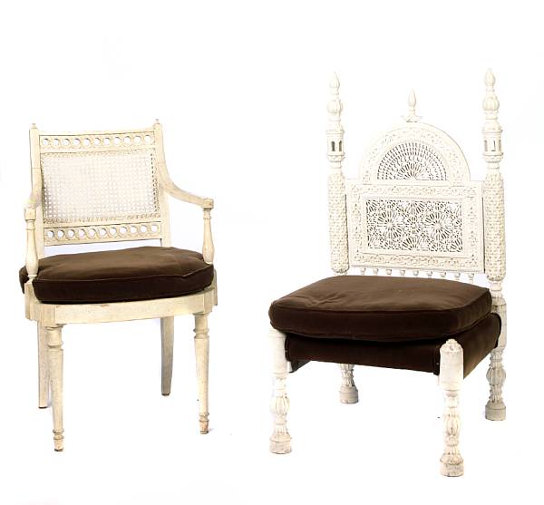 Appraisal: A set of four Neoclassical style painted and caned armchairs