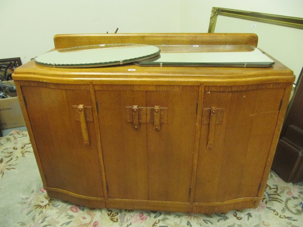 Appraisal: Oak sideboard oak drop leaf table and two wall mirrors