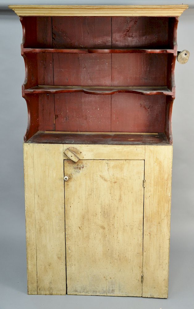 Appraisal: Primitive cupboard having cornice molding over two scalloped shelves over