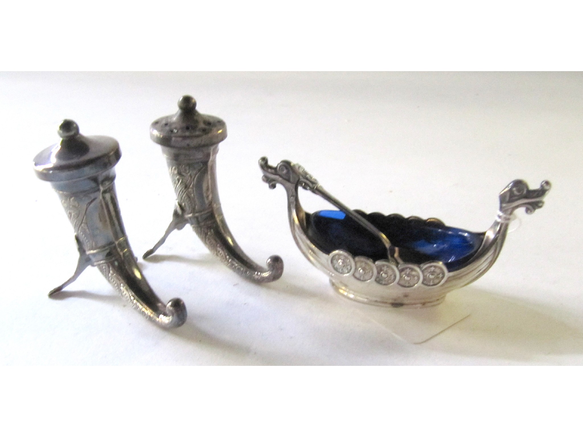 Appraisal: A lot comprising a Norwegian sterling silver horn shaped salt