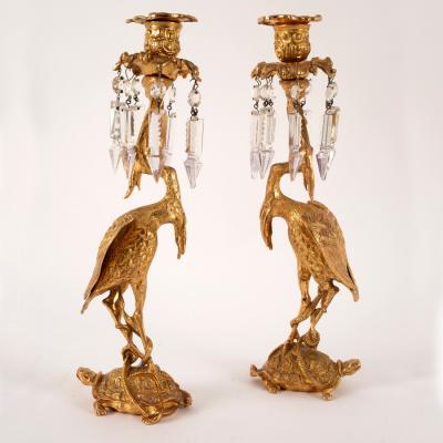 Appraisal: A pair of gilt metal figural candlesticks each of a