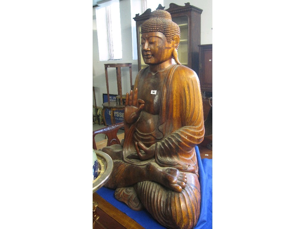 Appraisal: Carved hardwood Buddha figure