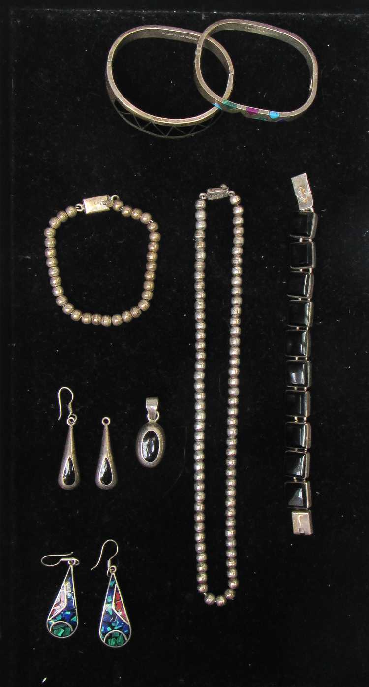 Appraisal: TEN ARTICLES OF STERLING TAXCO JEWELRY including a black inlay