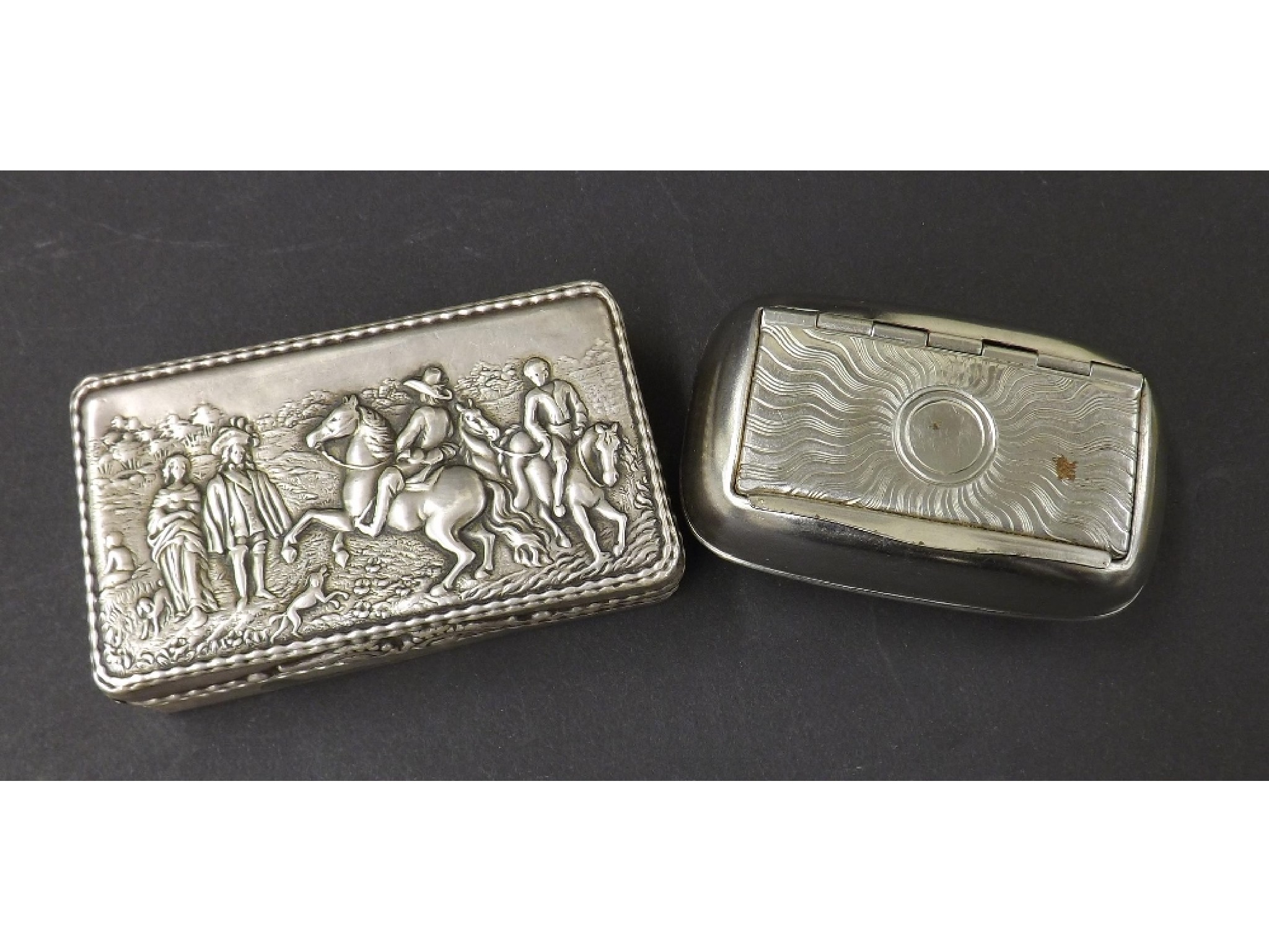 Appraisal: Continental silver snuff box the hinged lid embossed with men