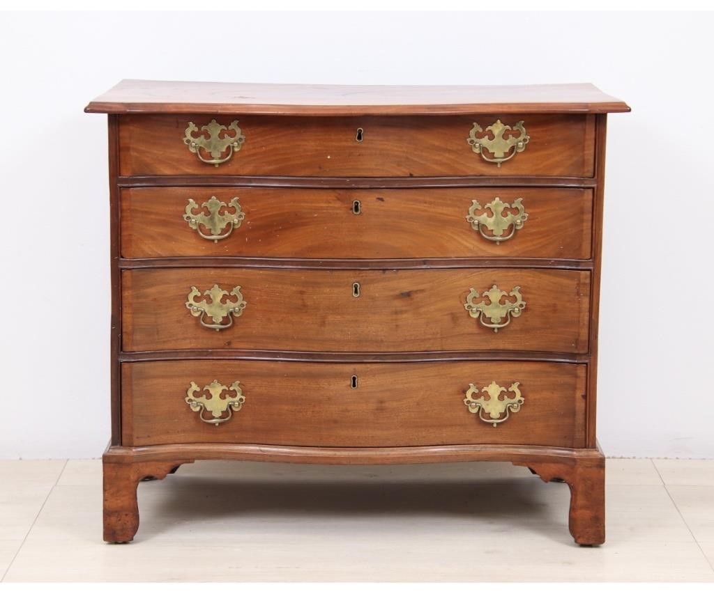 Appraisal: New England Chippendale mahogany serpentine front chest of drawers circa